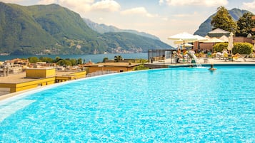 Indoor pool, seasonal outdoor pool, pool umbrellas, sun loungers