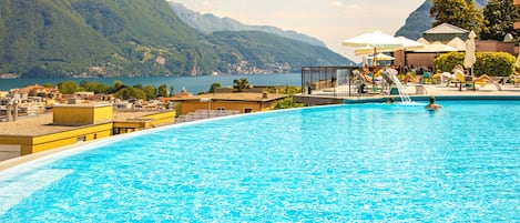 Indoor pool, seasonal outdoor pool, pool umbrellas, pool loungers