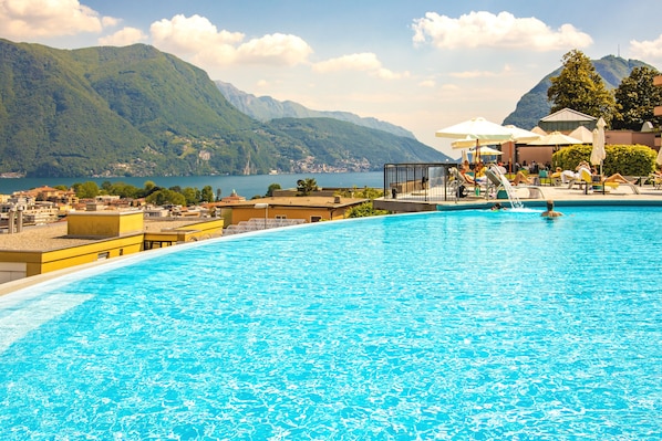 Indoor pool, seasonal outdoor pool, pool umbrellas, sun loungers