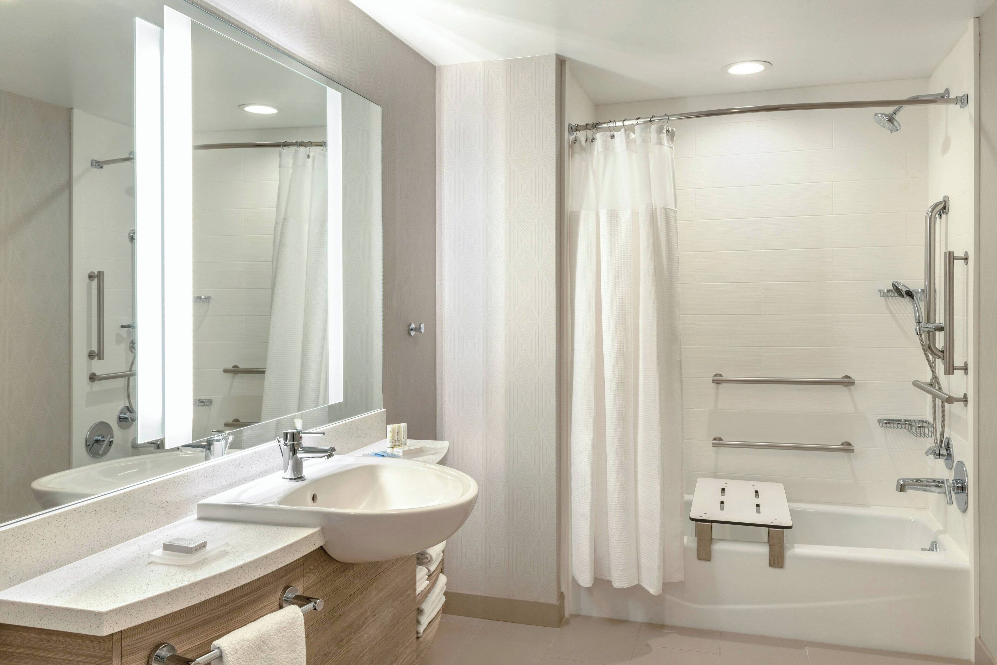 studio suite, 1 king bed, non smoking (mobility/hearing accessible, tub) | bathroom | free toiletries, hair dryer, towels