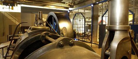 A large industrial machine with metallic components and a complex structure.