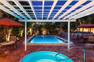 Outdoor pool, a heated pool, sun loungers