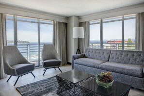 Suite, 1 King Bed with Sofa bed, Non Smoking, Corner (View) | Living room | 42-inch Smart TV with cable channels, TV