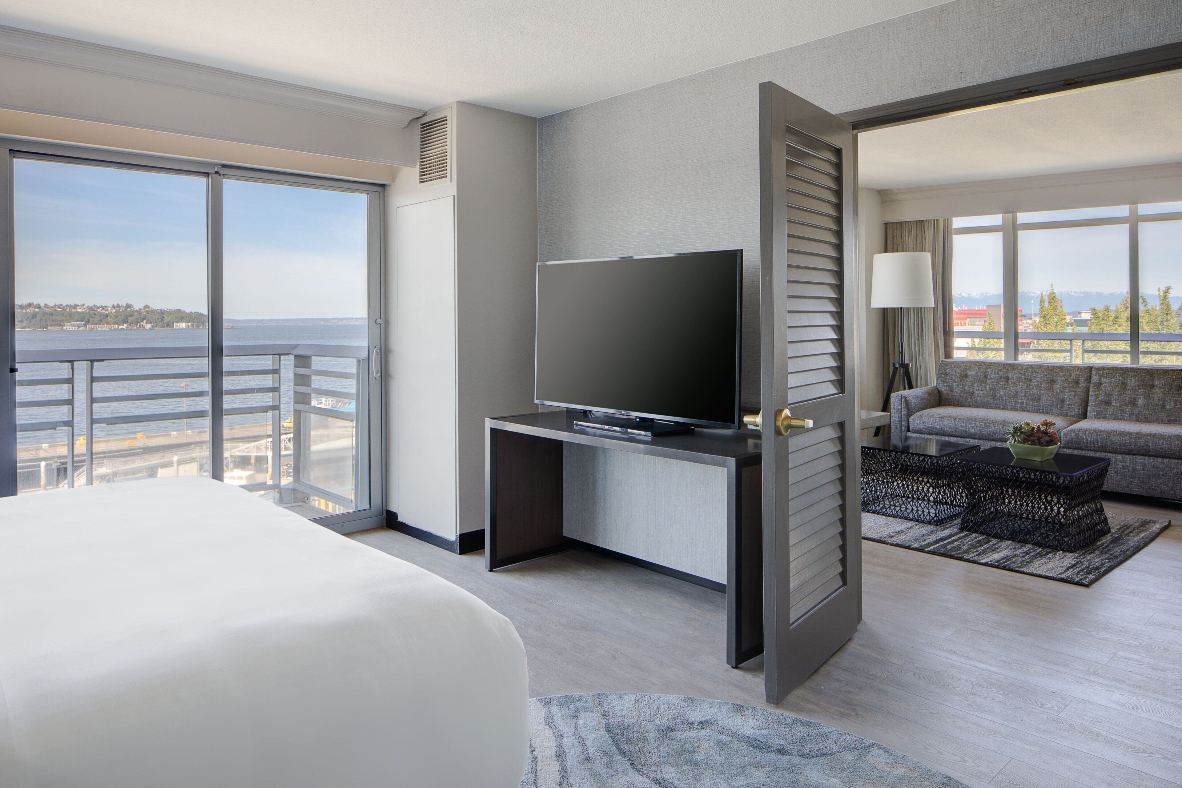 suite, 1 king bed with sofa bed, non smoking, corner (view) | down duvets, pillow-top beds, in-room safe, desk