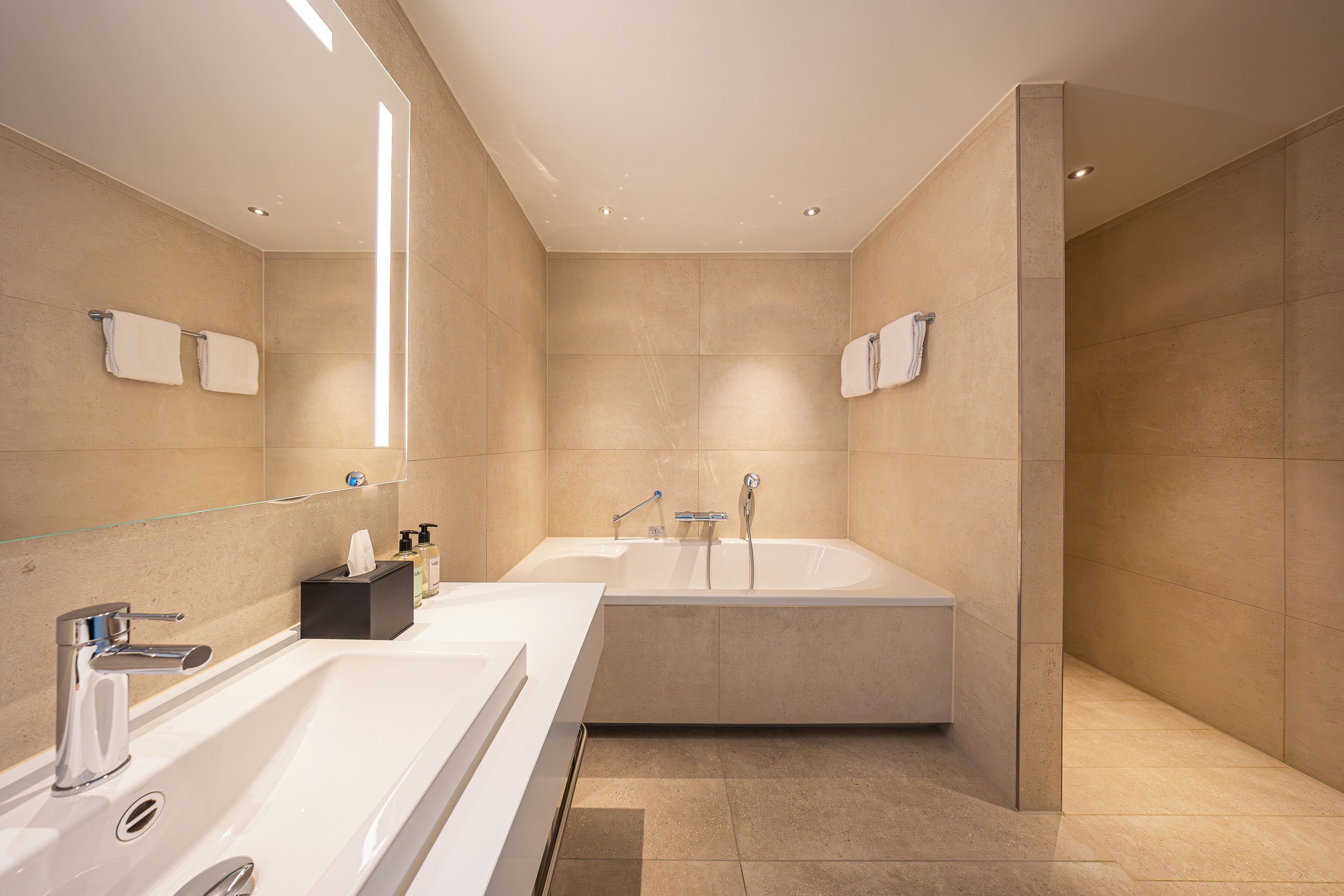 deluxe double room, 1 king bed | bathroom | free toiletries, hair dryer, towels, soap