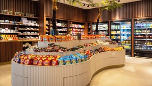 A snack display with various chips and snacks.