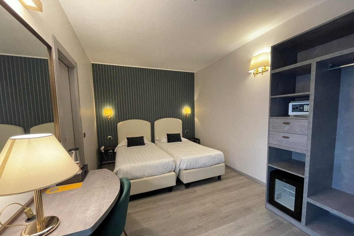 Habitación Confort con 2 camas individuales | Ropa de cama de alta calidad y minibar