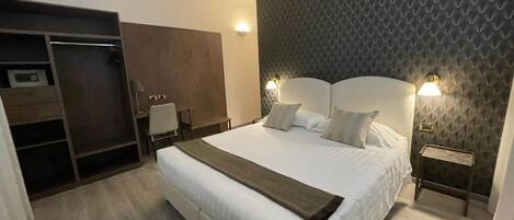 Ropa de cama de alta calidad y minibar