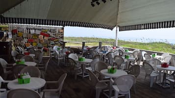 Lunch, dinner served; American cuisine, beach views