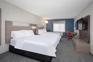 A hotel room with two beds, a desk, a chair, a television, and a window. - Holiday Inn Express & Suites Grand Junction by IHG (Grand Junction)