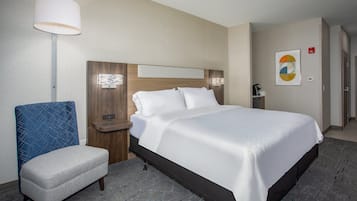 Hypo-allergenic bedding, desk, blackout drapes, iron/ironing board