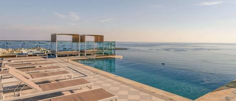 Indoor pool, 2 outdoor pools, free pool cabanas, pool umbrellas