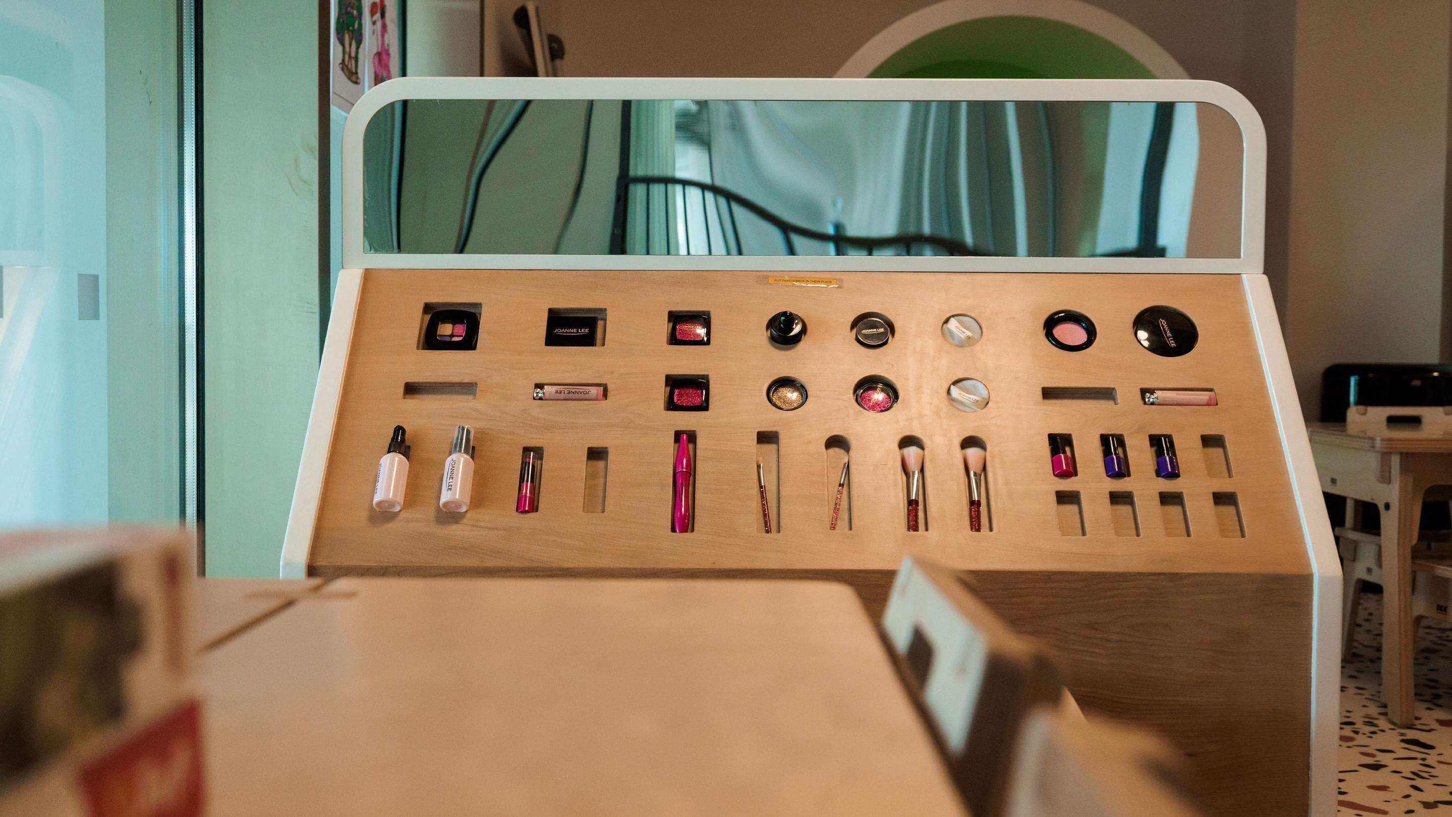 A makeup organizer with various products.