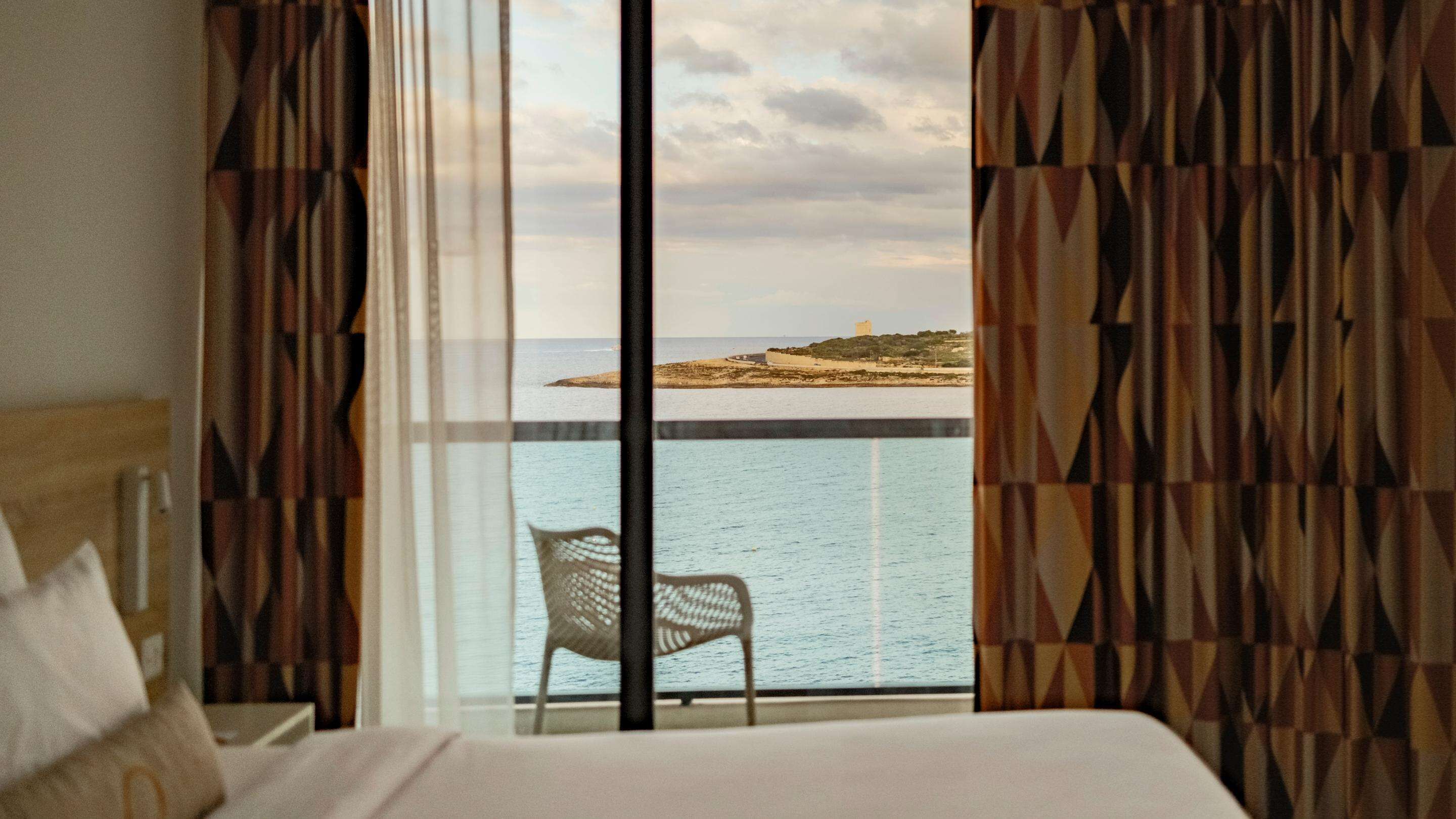 quadruple room, sea view | 1 bedroom, minibar, in-room safe, blackout curtains