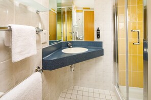 Shower, eco-friendly toiletries, hair dryer, towels