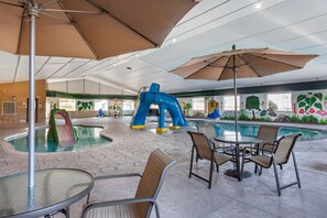 Indoor pool, open 7 AM to 11 PM, pool loungers