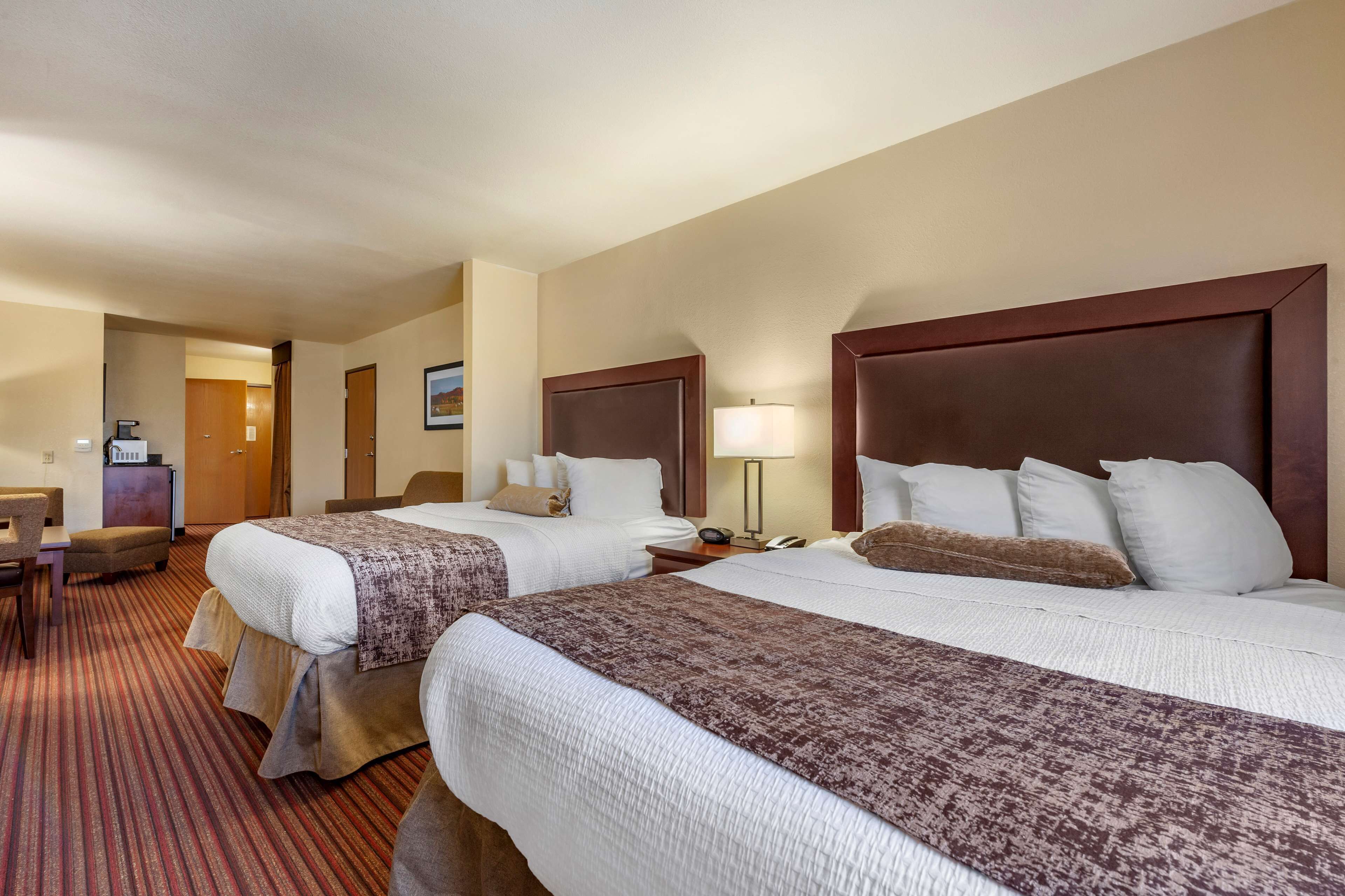 standard room, 2 queen beds, non smoking, refrigerator & microwave (oversized room) | desk, blackout curtains, iron/ironing board, free cots/infant beds