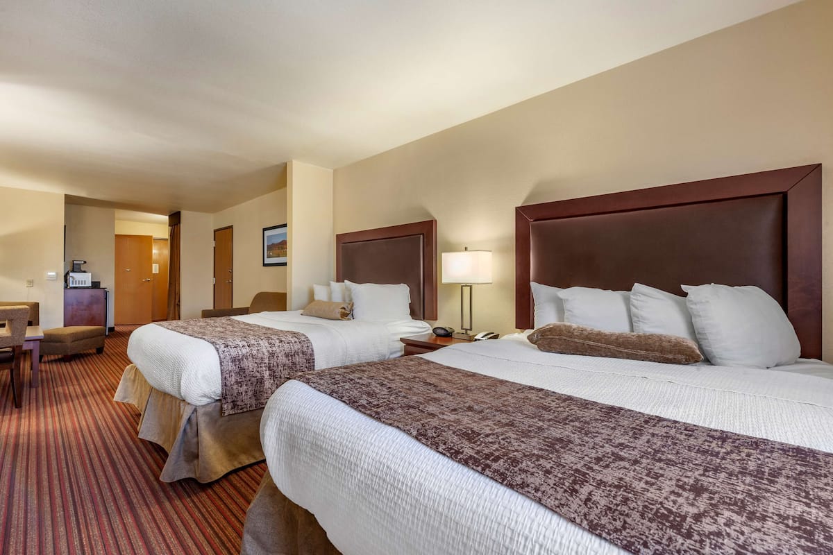 standard room, 2 queen beds, non smoking, refrigerator & microwave (oversized room) | desk, blackout curtains, iron/ironing board, free cots/infant beds