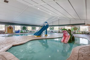 Indoor pool, open 7 AM to 11 PM, pool loungers