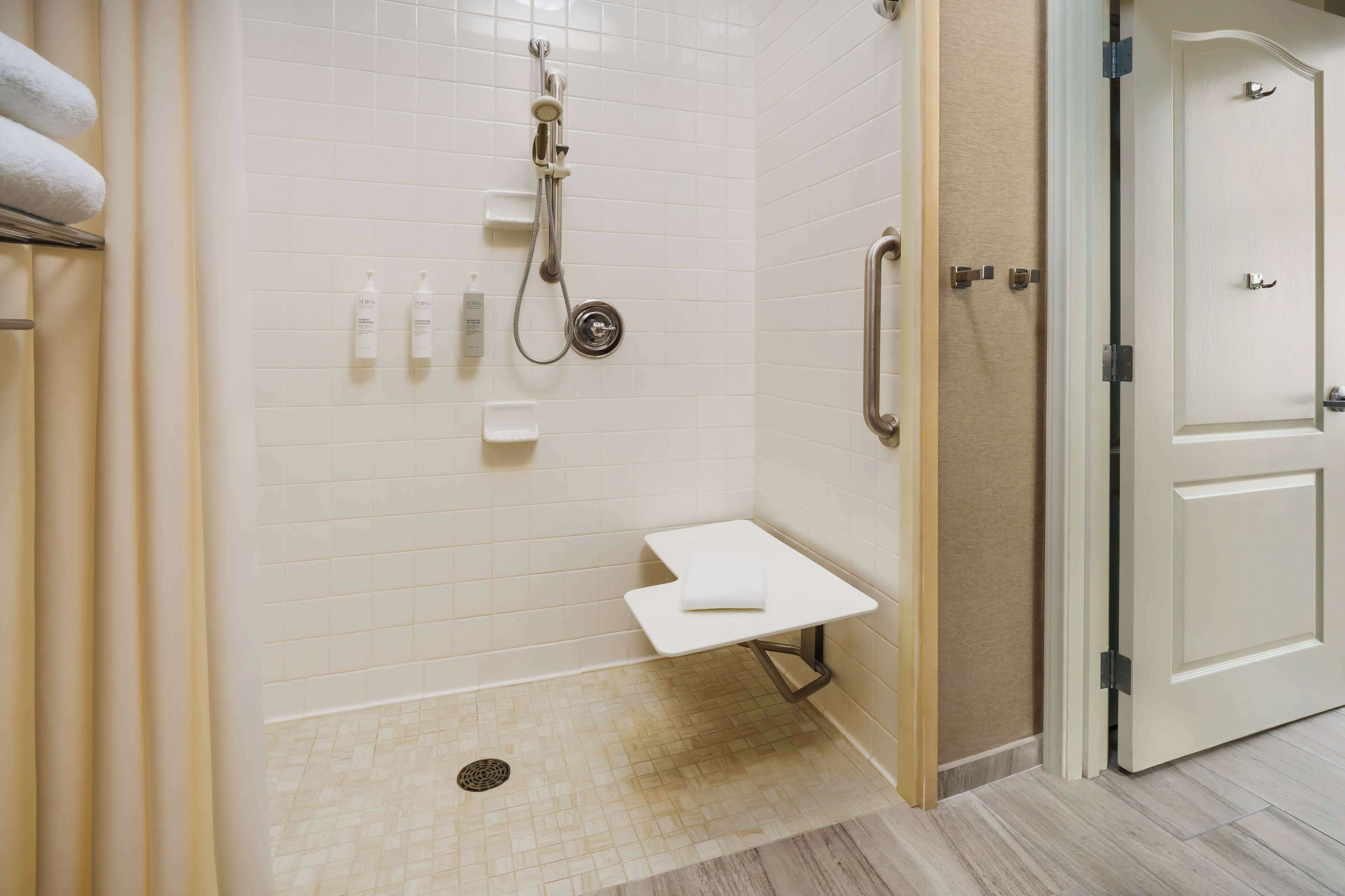 2-bedroom suite, mobility accessible | bathroom shower