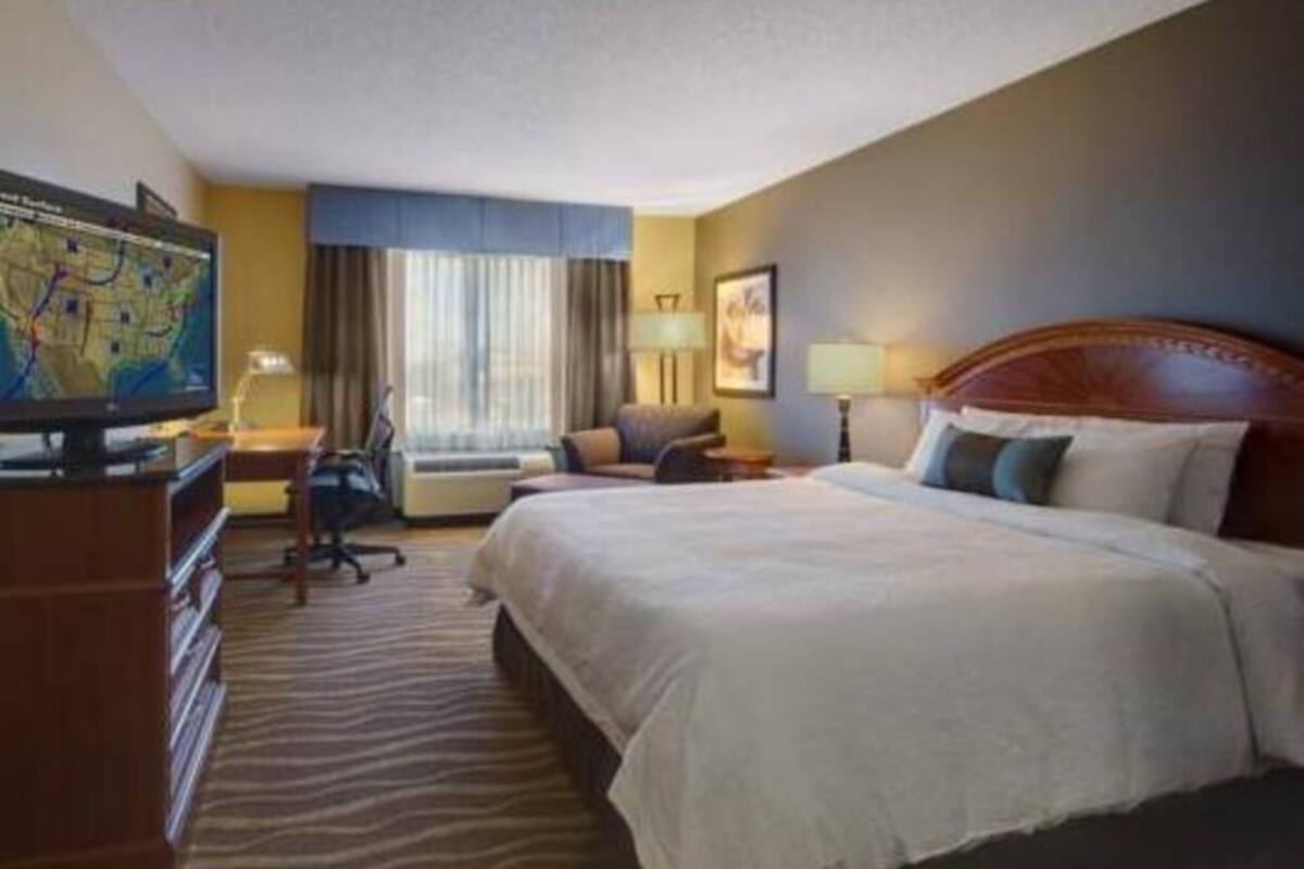 Hypo-allergenic bedding, down comforters, desk, laptop workspace