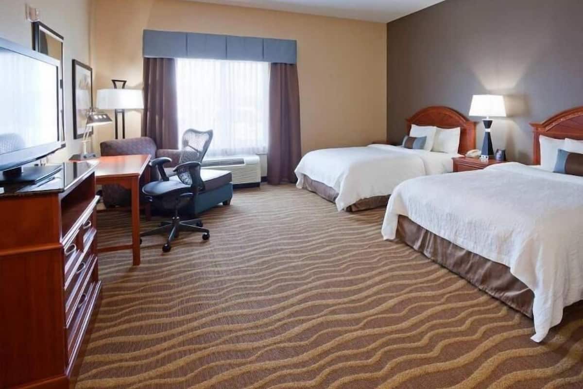 Hypo-allergenic bedding, down comforters, desk, laptop workspace