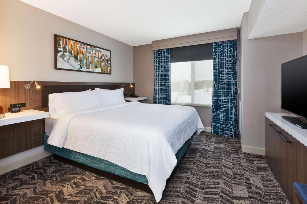 Hypo-allergenic bedding, down comforters, desk, laptop workspace