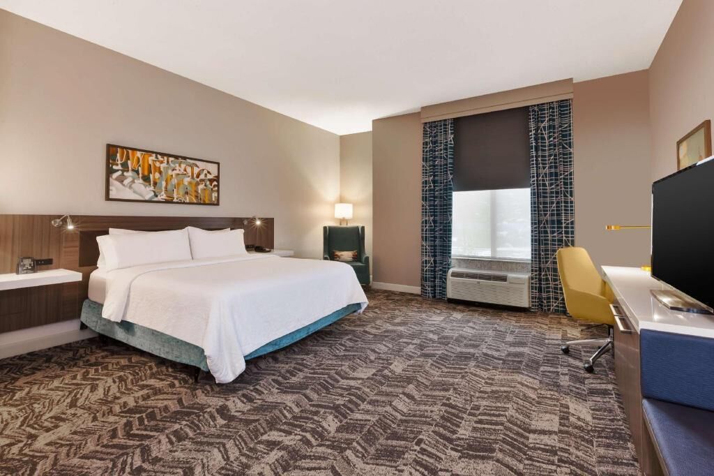 Hypo-allergenic bedding, down comforters, desk, laptop workspace