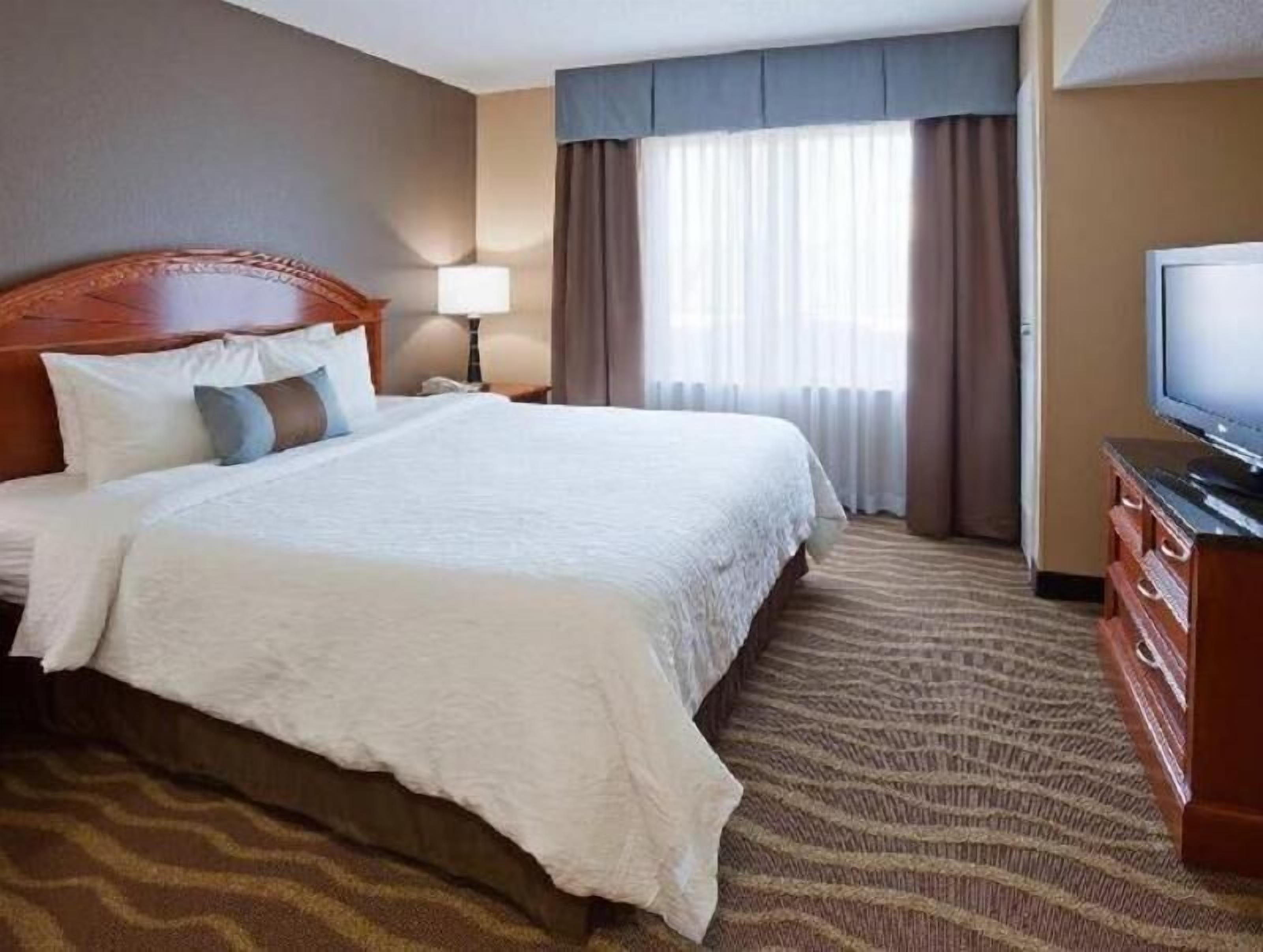 Hypo-allergenic bedding, down comforters, desk, laptop workspace