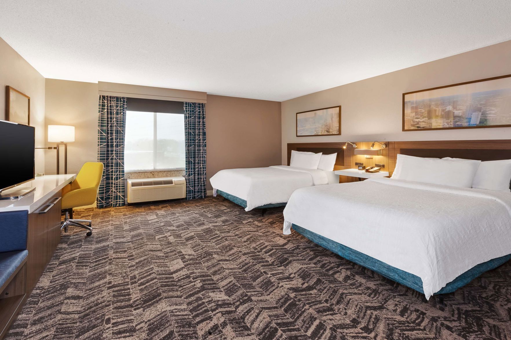 Hypo-allergenic bedding, down comforters, desk, laptop workspace