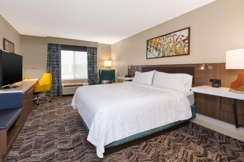 Hypo-allergenic bedding, down comforters, desk, laptop workspace
