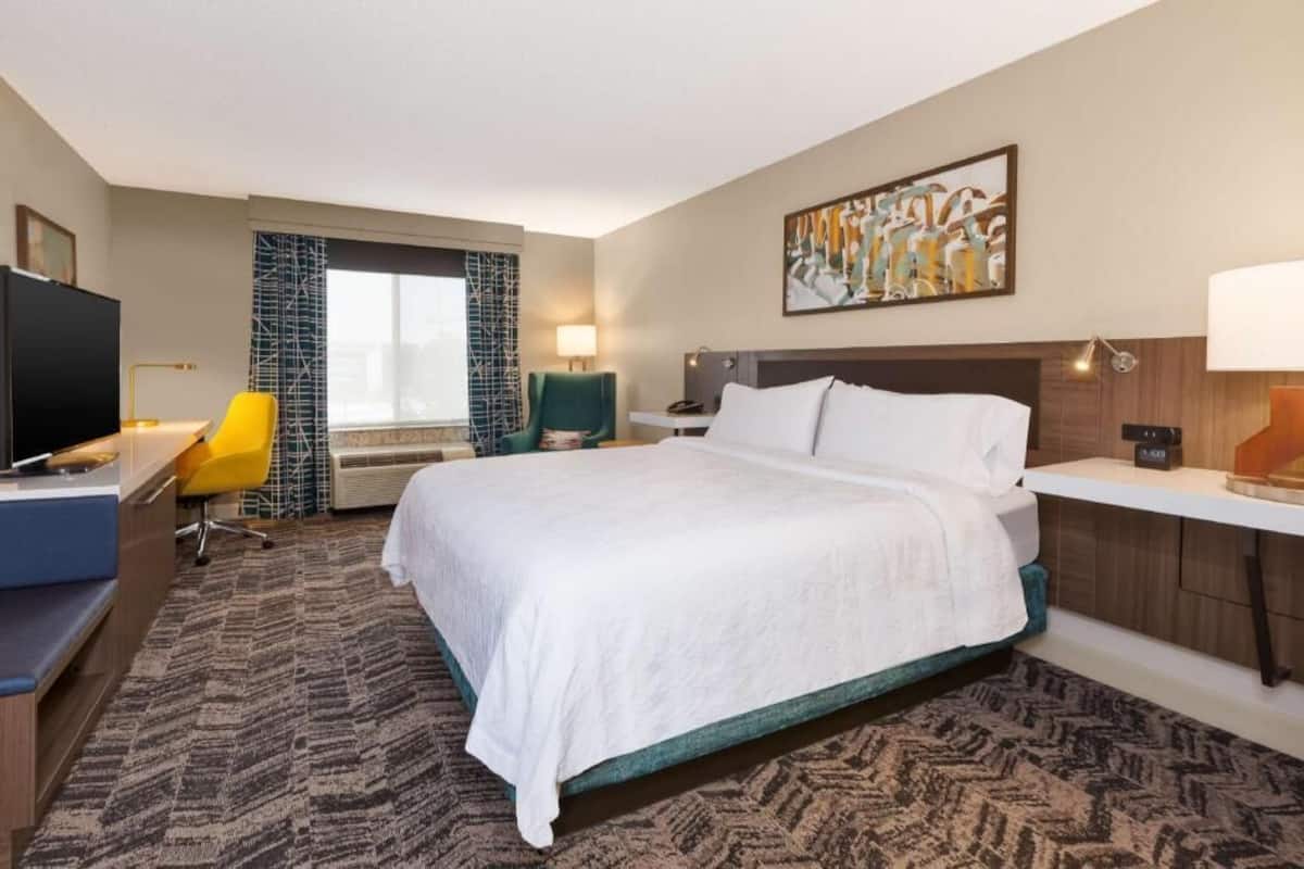 Hypo-allergenic bedding, down comforters, desk, laptop workspace