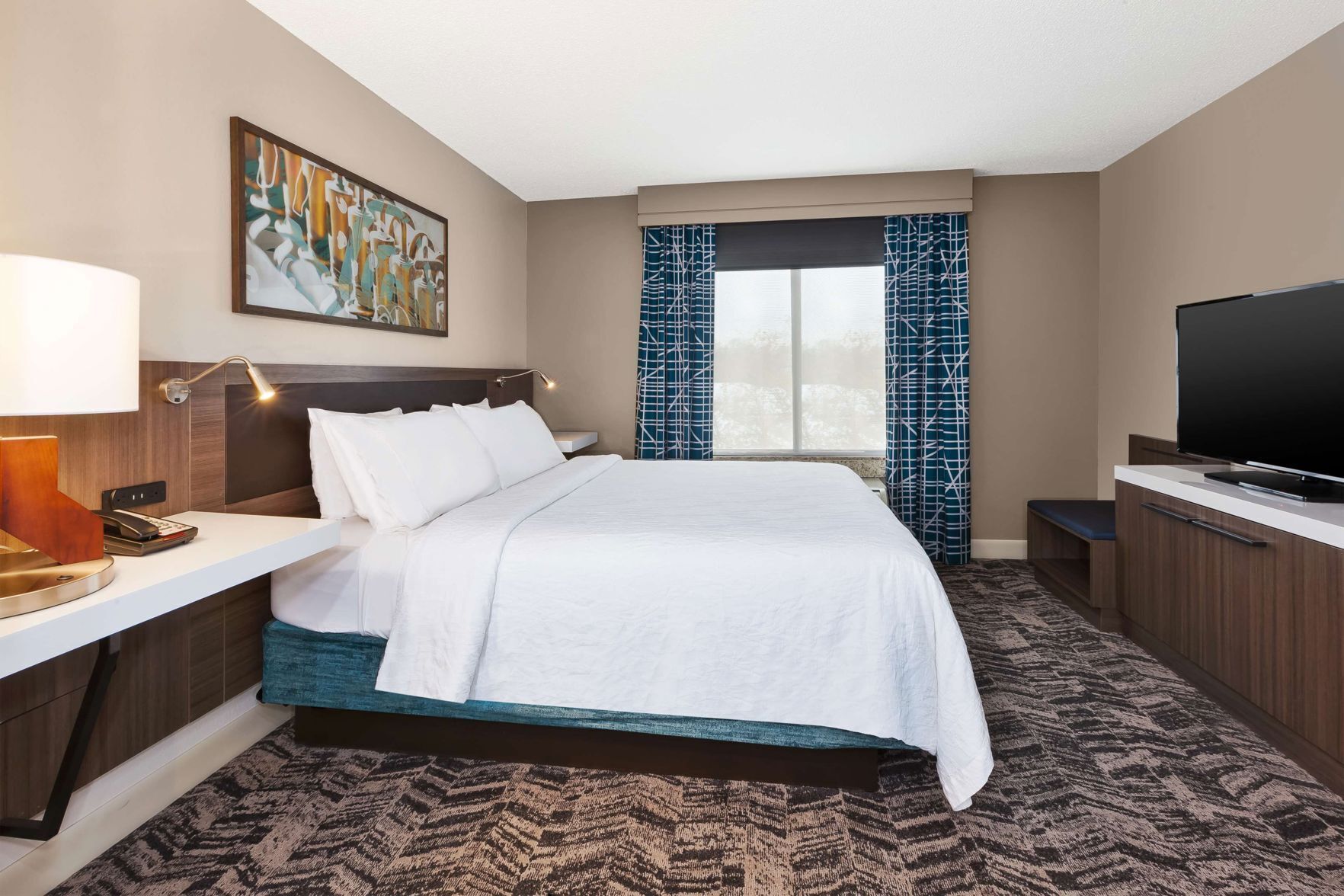 Hypo-allergenic bedding, down comforters, desk, laptop workspace