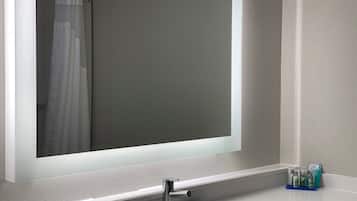 Combined shower/bathtub, deep-soaking bathtub, rainfall showerhead