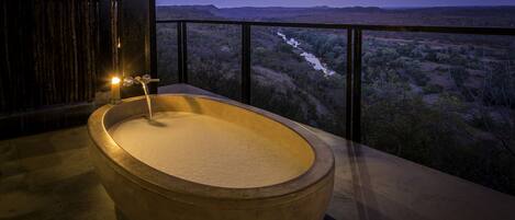 Luxury River View Space | Outdoor spa tub