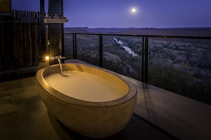 Luxury River View Space | Outdoor spa tub