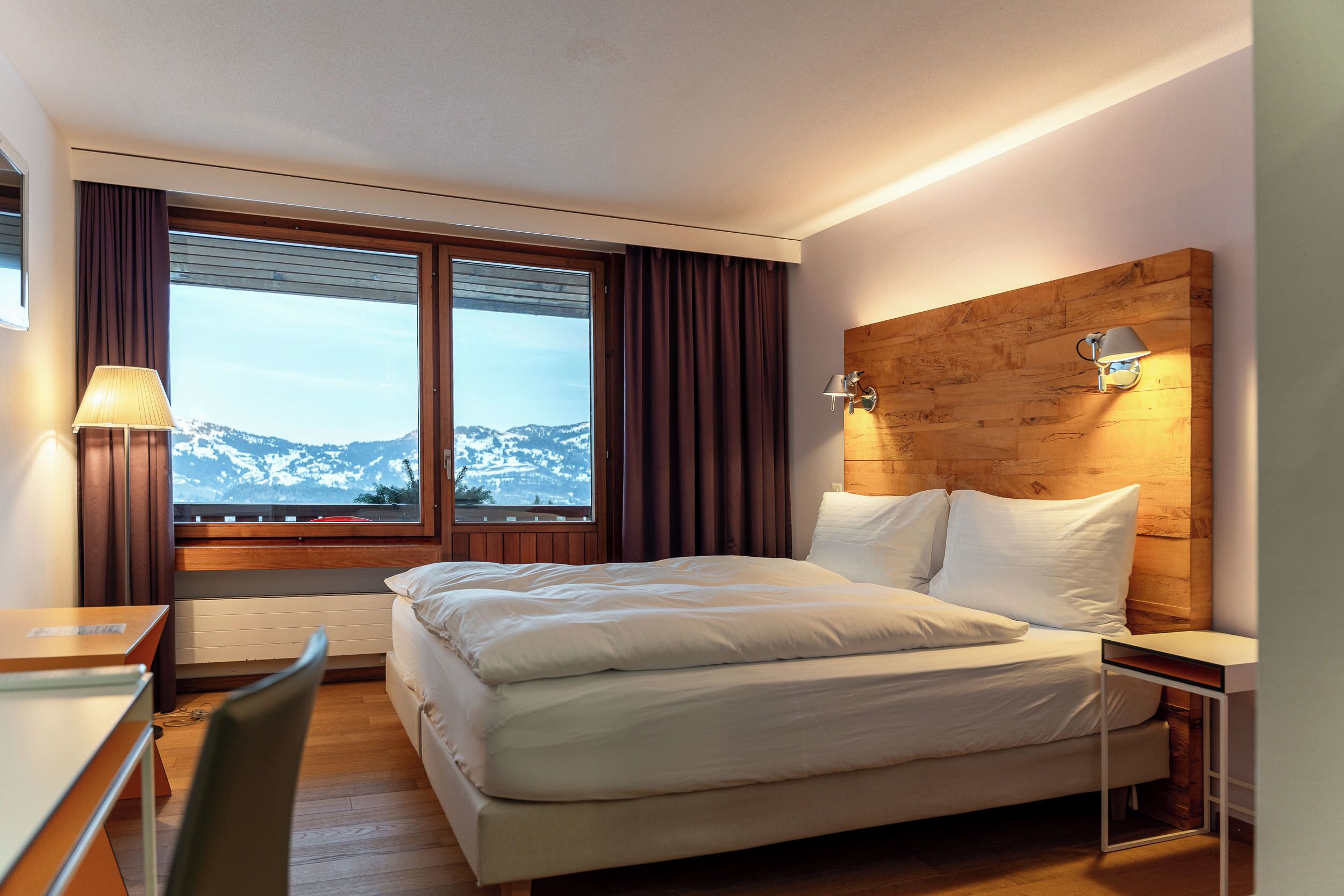 Hypo-allergenic bedding, down duvets, in-room safe