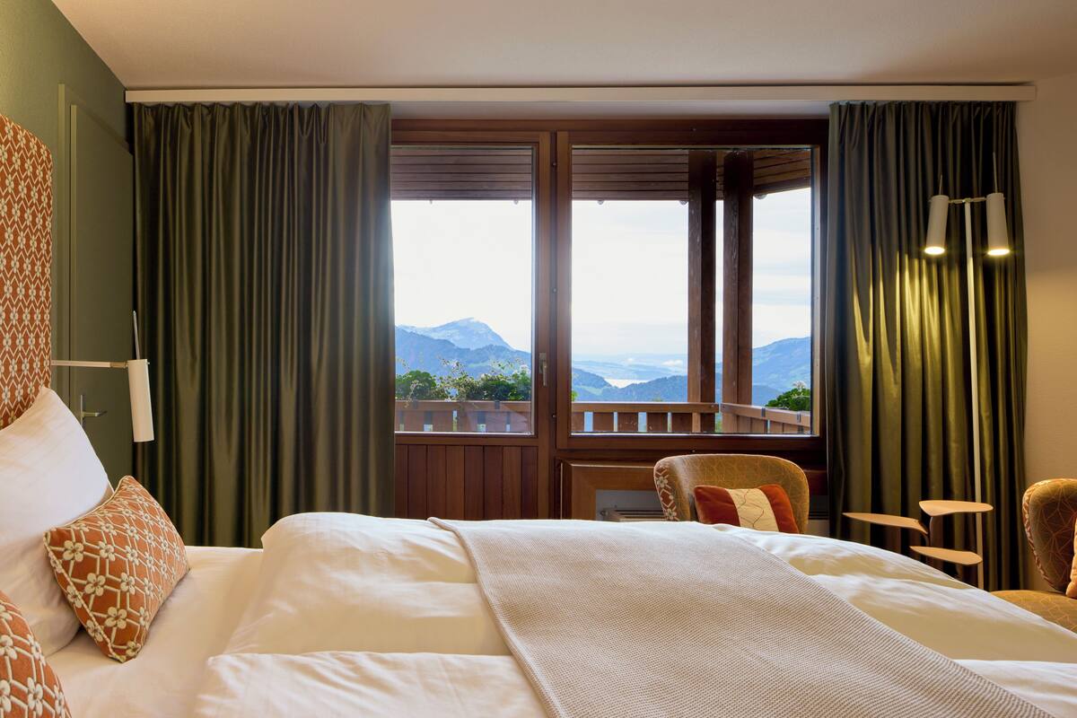 deluxe double room, balcony | hypo-allergenic bedding, down duvets, in-room safe