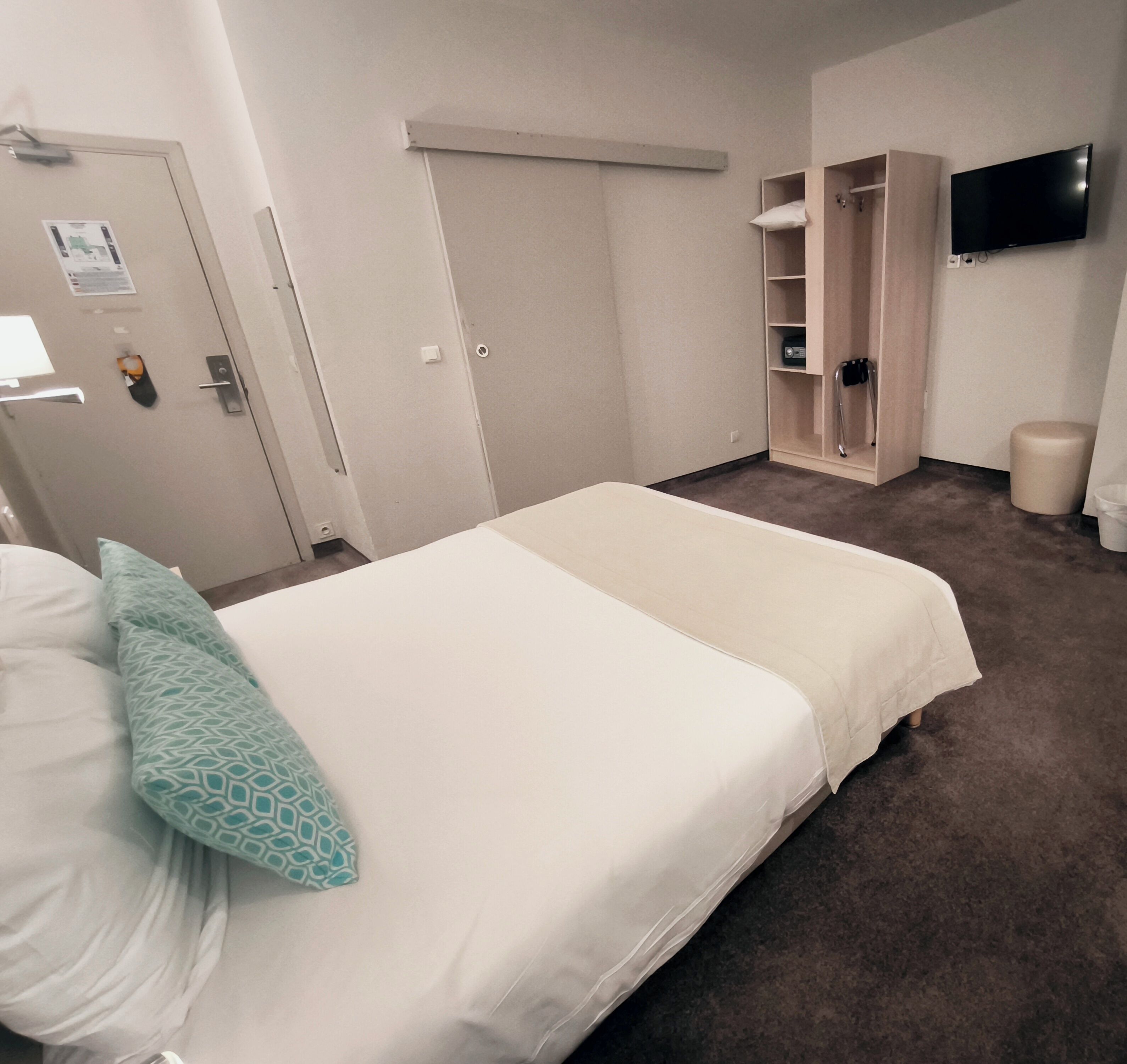 classic double room, ground floor | minibar, in-room safe, desk, blackout curtains
