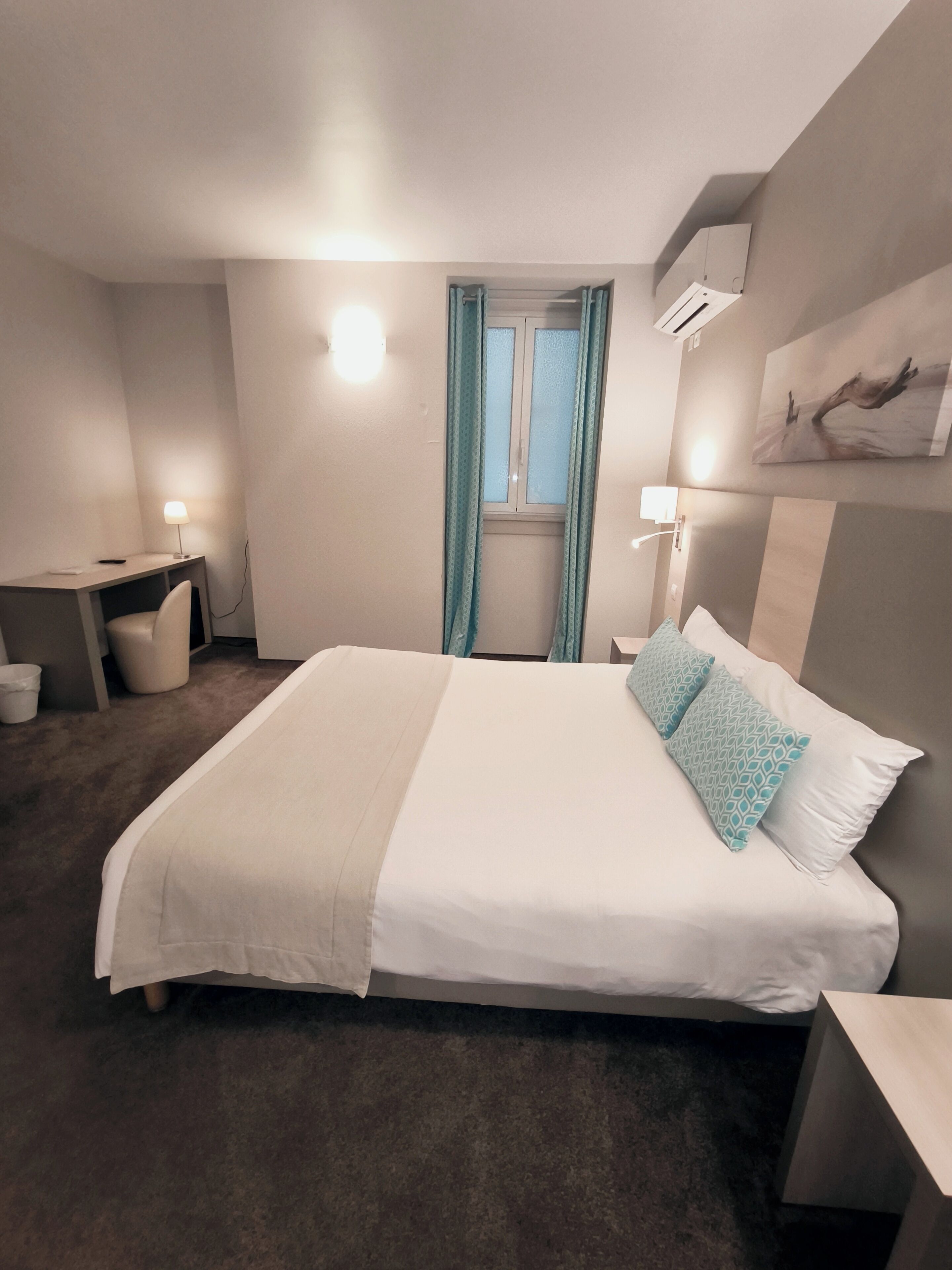 classic double room, ground floor | minibar, in-room safe, desk, blackout curtains