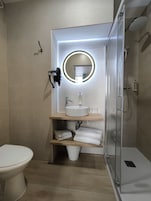 Shower, free toiletries, hair dryer, towels