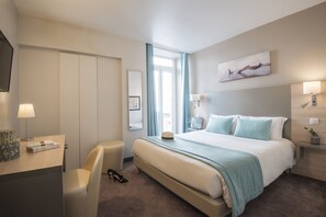 Standard Double Room | Minibar, in-room safe, desk, blackout curtains