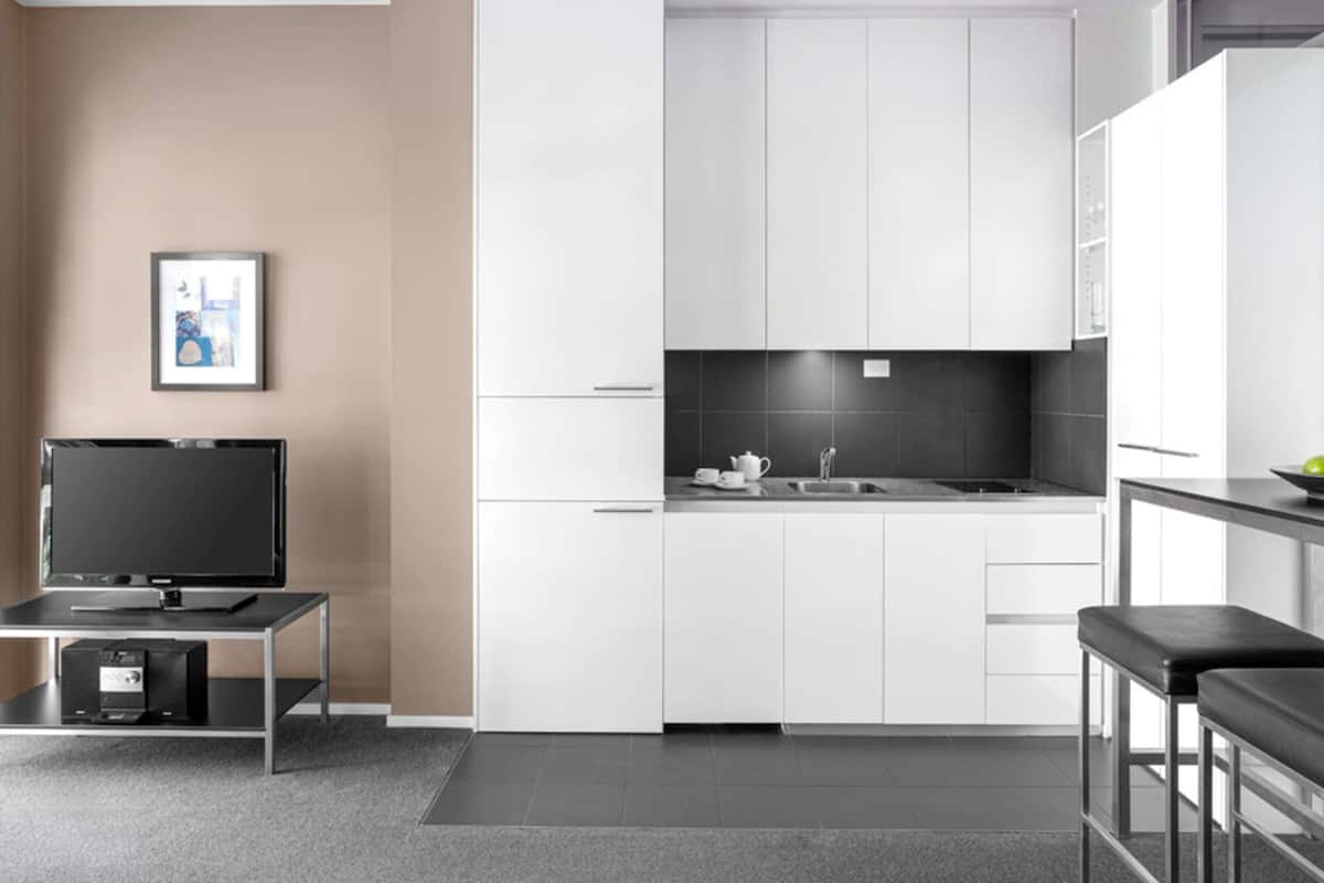 Desk, laptop workspace, cots/infant beds, rollaway beds