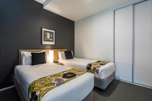 Desk, laptop workspace, cribs/infant beds, rollaway beds