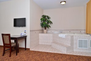 Suite, 1 King Bed (Jacuzzi) | Desk, iron/ironing board, cribs/infant beds, free WiFi