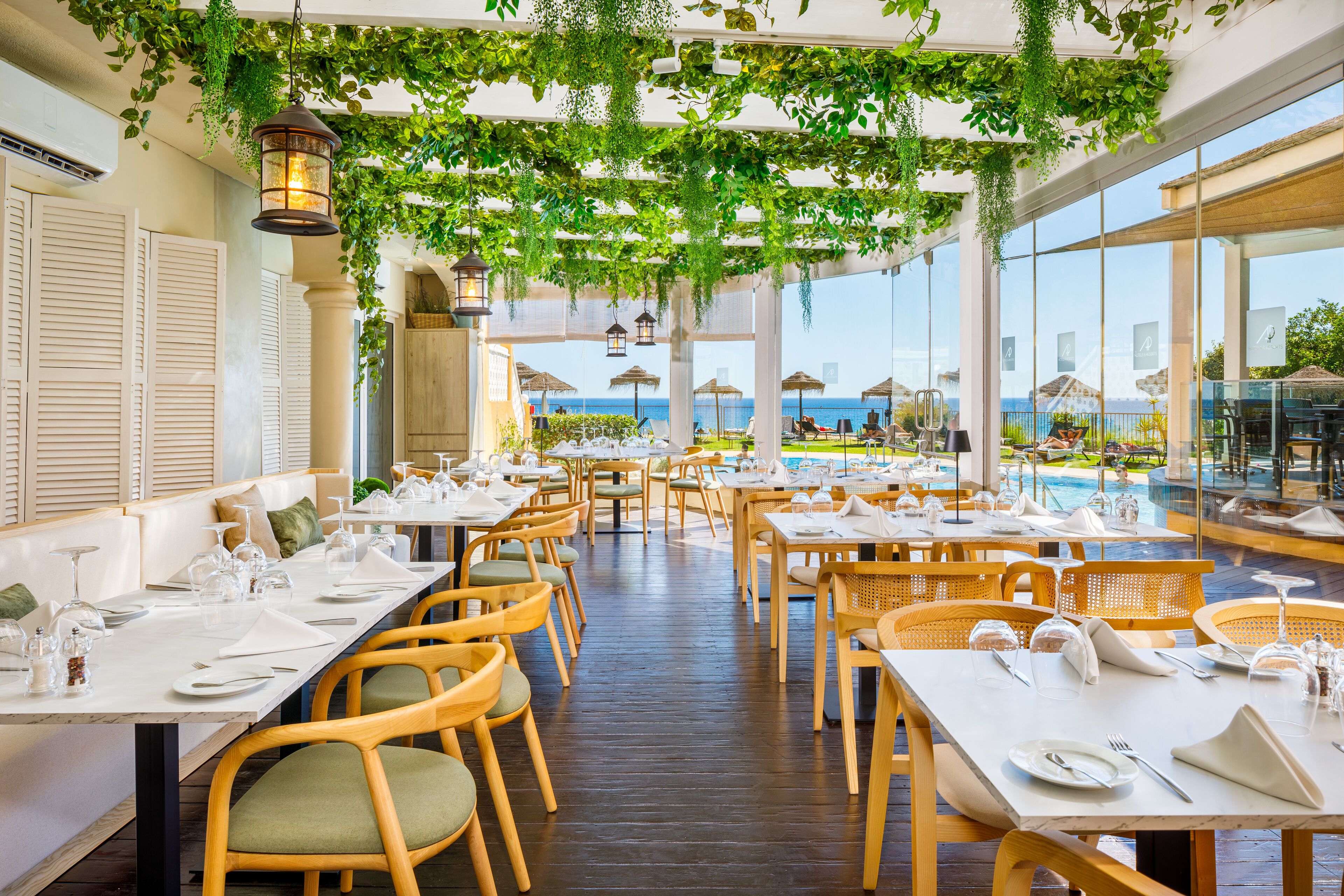 Breakfast, lunch, dinner served; international cuisine, beach views 