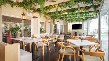 Breakfast, lunch, dinner served; international cuisine, beach views