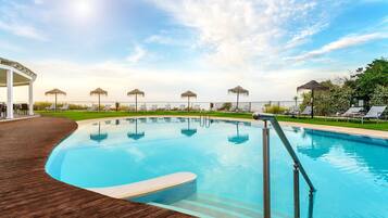 Outdoor pool, pool umbrellas, pool loungers