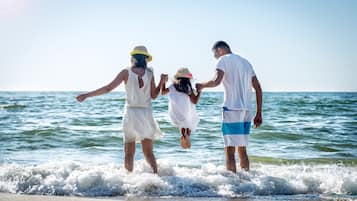 Family moments are made here, where the beach meets serenity.