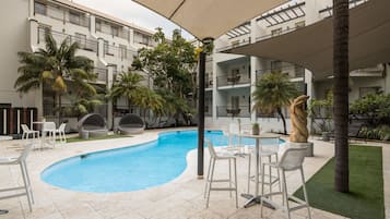 2 outdoor pools, pool umbrellas, pool loungers